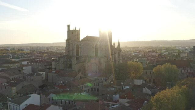 Narbonne, South of France, Occitanie, drone footage, 4K resolution, high-definition, historic, cathedral, Gothic architecture, aerial view, skyline, French Riviera, heritage, culture, tourism, travel,