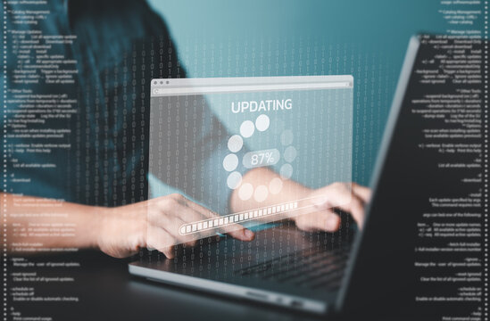 Update software application and hardware upgrade technology concept, Firmware or Operating System update, Man using computer with comfirm button and percent progress bar screen. Installing app patch.