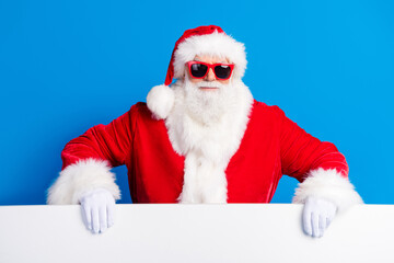 Photo portrait of elderly retired man white poster wall wear trendy santa claus costume coat isolated on blue color background