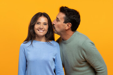 Cheerful senior caucasian man kiss in chick lady, enjoy spare time