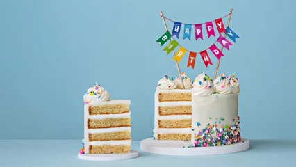 Foto op Plexiglas Birthday cake with slice removed and happy birthday cake topper © Ruth Black