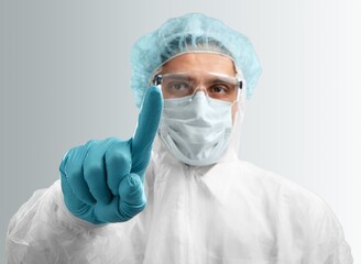 Man doctor in coat shows hands background