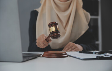 Business and lawyers discussing contract papers with brass scale on desk in office. Law, legal...