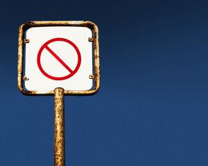 rusty blank prohibite sign on pole