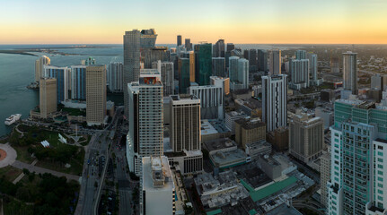 Aerial view of downtown district of of Miami Brickell in Florida, USA at sunset. High commercial...