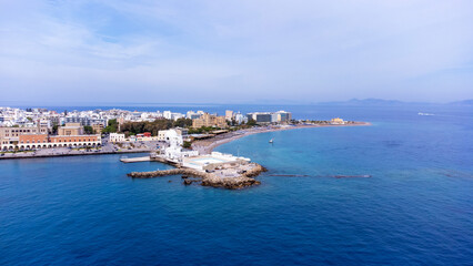 Mandraki port of Rhodes city harbor and Elli beach a popular summer tourist destination, aerial...