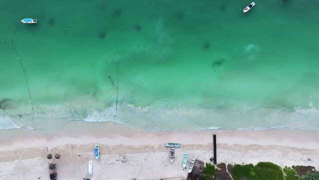 Aerial view of sailing boats along the shoreline in Tulum, Quintana Roo, Mexico.