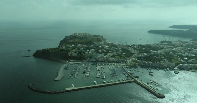 Aerial view of the harbour and the port in Procida Island, Flegree Islands archipelagos, Naples, Campania, Italy.