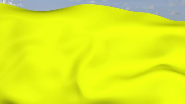 Loop der gelben Fahne wehend im Wind als Nahaufnahme 4K