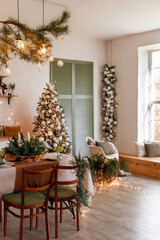 Modern Kitchen Interior with Island, Sink, Cabinets in New Luxury Home Decorated in Christmas Style.