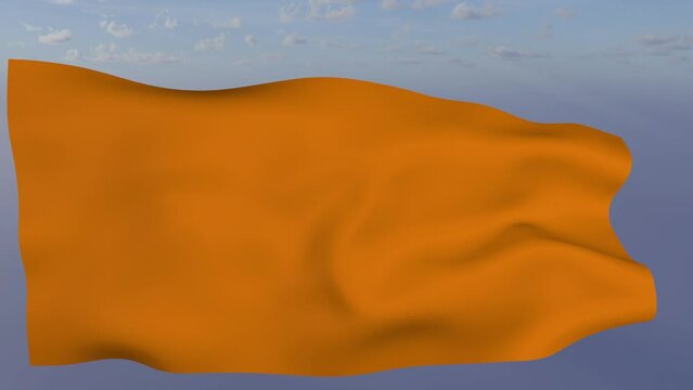 Loop der orangene Fahne wehend im Wind als Nahaufnahme 4K