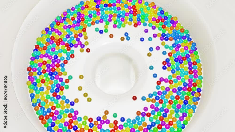 Aufkleber multi-colored balls fall and are collected in a hole in the center. 3d render.