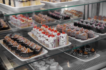 Cakes on a showcase in a restaurant