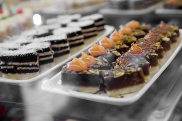 Cakes on a showcase in a restaurant