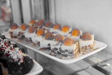 Cakes on a showcase in a restaurant