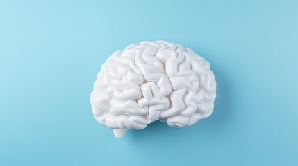 Human brain made of paper isolated on blue background. Mental health and problems with memory.