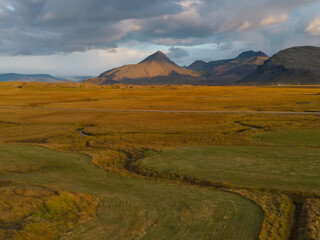 Fototapeta premium Aerial top view of mountains in Iceland islands in the summer season, Europe hills, nature landscape background.