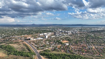 Obraz premium Residential view of houses in phase 2 with the Central Business District CBD in the background, Gaborone, Botswana, Africa