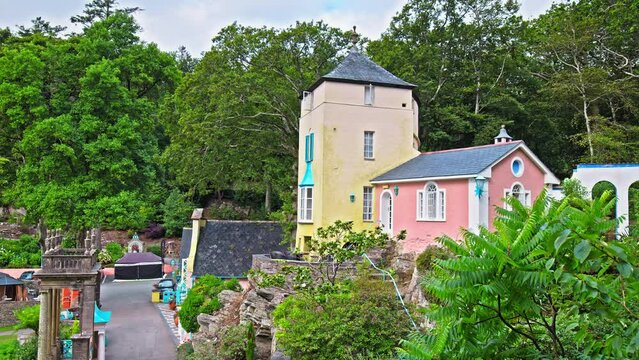 Baroque style of Tourist village of Portmeirion in Gwynedd, North Wales. Colourful Houses in Italian Style Tourist Village On The Coast Of North Wales.