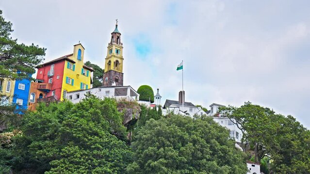 Panoramic view of The Dome and Tower with a clock in Portmeirion North Wales. Colourful houses in baroque style tourist village in Gwynedd, North Wales.