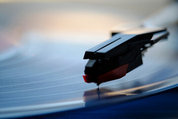 Classic vinyl record player closeup.
