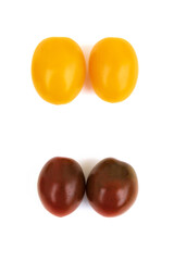 Different sorts of tomatoes isolated on white background.
Fresh, ripe type of small and round cocktail tomatoes, of red, yellow and orange color. Solanum lycopersicum var. cerasiforme. 