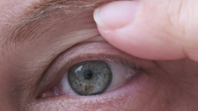 Close-up of eye of middle-aged woman with wrinkles on eyelids, Embracing Aging concept, Aging Eyes' Skin, Women's Health, Capturing Age-Related Changes