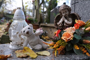 all saints day, angel, autumn, candle, catholic, Child's grave with glass candle, little white...