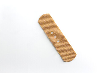 Band-aid on white background. Band-aid punctuation, backslash.