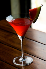 red cocktail/jucie on the table 