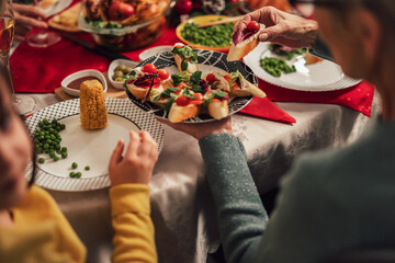 Family enjoying in a lunch together at home. Family on Christmas dinner at home
