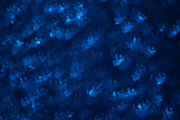 Fototapeta na wymiar angel neutral shaped structured blue background with bokeh effect