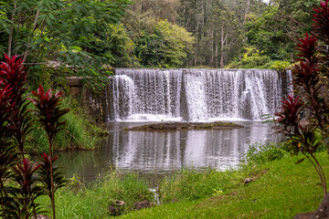 A stone dam with beautiful waterfall in Kauai, Hawaii, United States.
