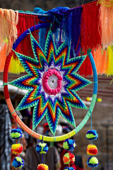 Peruvian decor. Colorful knitted decor on a circle