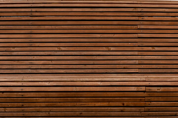 Beautiful wooden bench with smooth slats