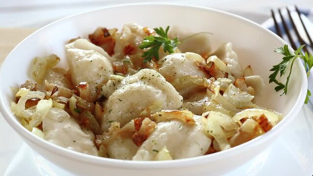 Ukrainian Vareniky or Pierogi stuffed with potato and mushrooms