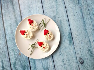 Christmas food art made from eggs, funny Santa eggs, Santa eggs