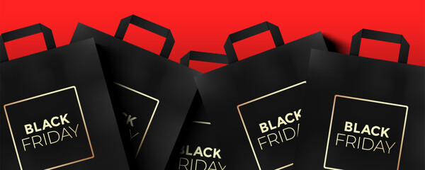 Bunch of Black Friday gift shopping bags on the red background, vector banner design.