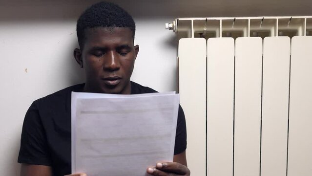 portrait of discouraged african man by the bureaucratic problems of obtaining a residence permit