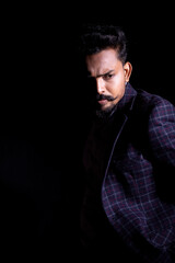 portrait of a man with moustache's wearing coat 