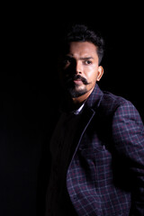 portrait of a man with moustache's wearing coat 