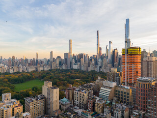 Aerial photo New York Central Park. View of highrise condominium buildings and fall foliage - obrazy, fototapety, plakaty