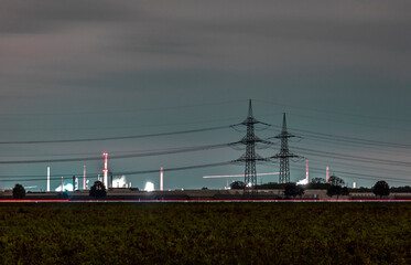 Electric Power Transmission Towers at night