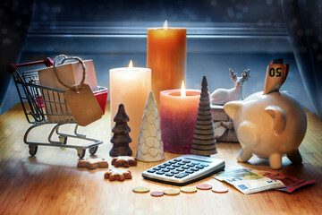 Holiday shopping. Calculator, Christmas decoration, calculator, piggy bank, shopping cart and...