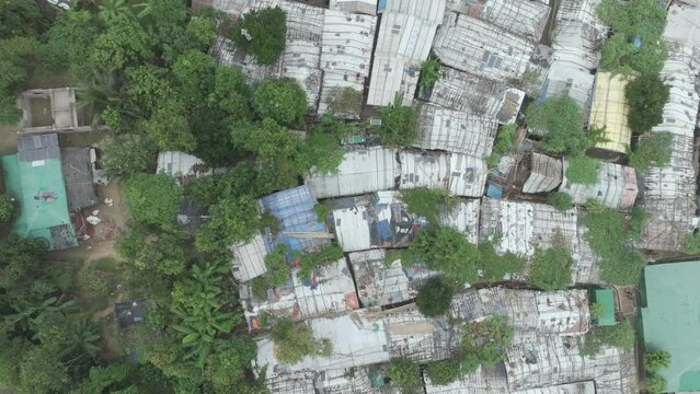 Top aerial view of Rohingya refugee camp, Ukhiya, Cox's bazar, Bangladesh. 4k smooth video footage.