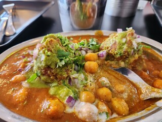 Spicy curry with chickpeas, Indian style food.