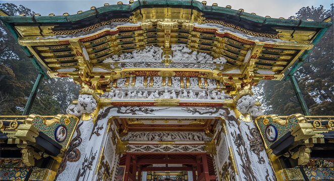 Detail of Karamon Gate cravings lacquered with gold and black at Nikko Toshogu Shinto shrine. Located in Nikko, Tochigi Prefecture, Japan. It is a UNESCO World Heritage Site.