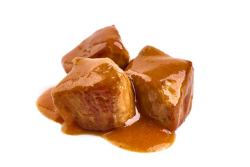 Stewed pork goulash, isolated on white background.