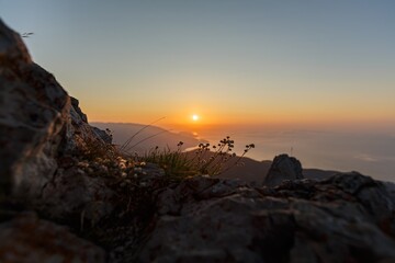Beautiful mountain landscape with sunset sky with sea