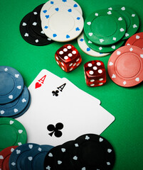 Playing cards, dice and poker chips from above on the green poker table - 674913200